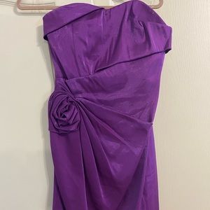 Occasion dress. Strapless sweetheart, knee length. Color is purple orchid.